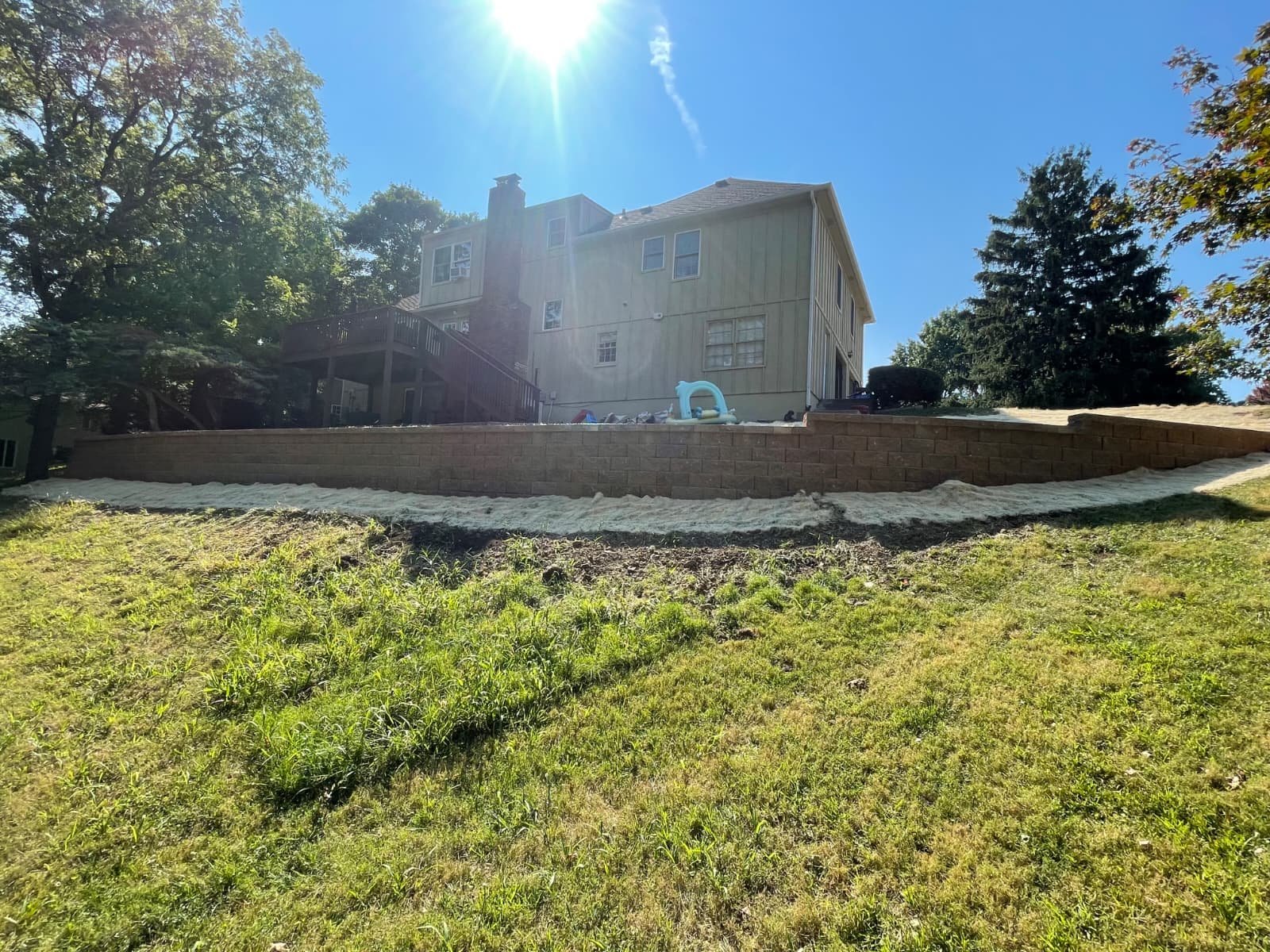 Level terrace with retaining wall